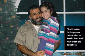 This photo of Yassin Aref and his 6-year-old daughter was taken during a rare prison visit.